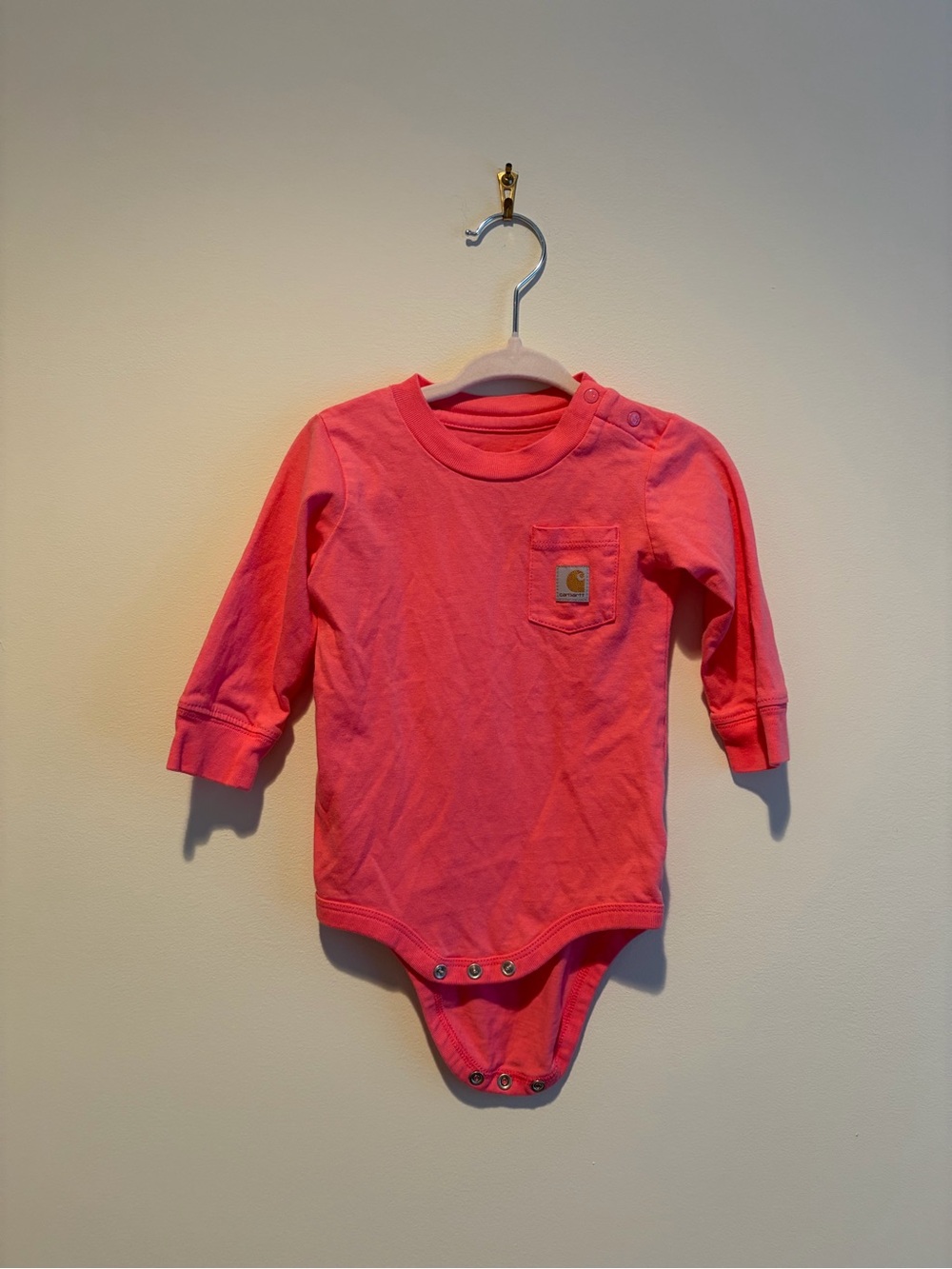 Carhartt Coral Pink Long-Sleeve Baby Bodysuit with Chest Pocket